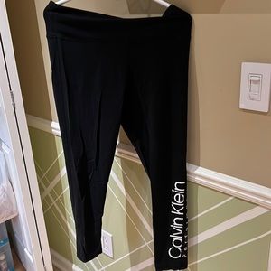 Calvin Klein black leggings with logo on left leg
